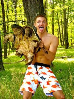 Jordan Anderson Poses With Snapping Turtle